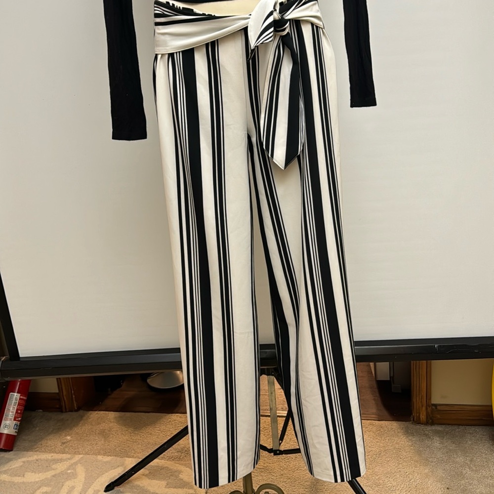 Off white with black stripe wide leg pants with tight on the side